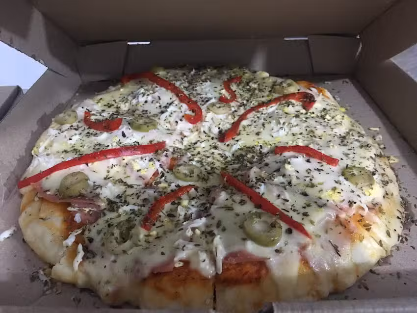 Rotiser&iacute;a Los Amigos